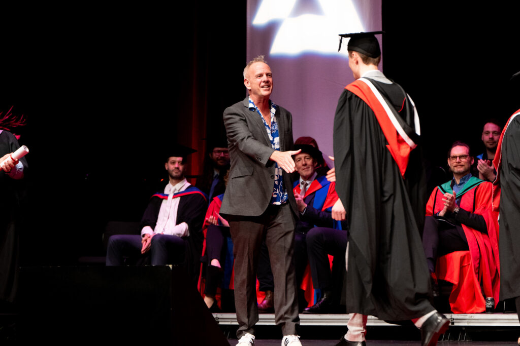 Fatboy Slim shaking hands
